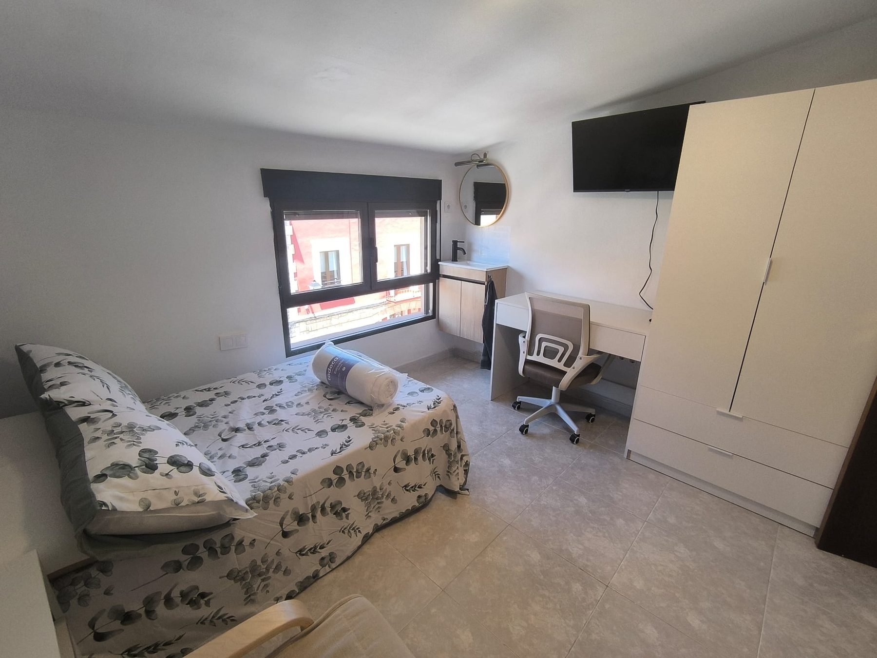 Habitación de coliving equipada por New Rent